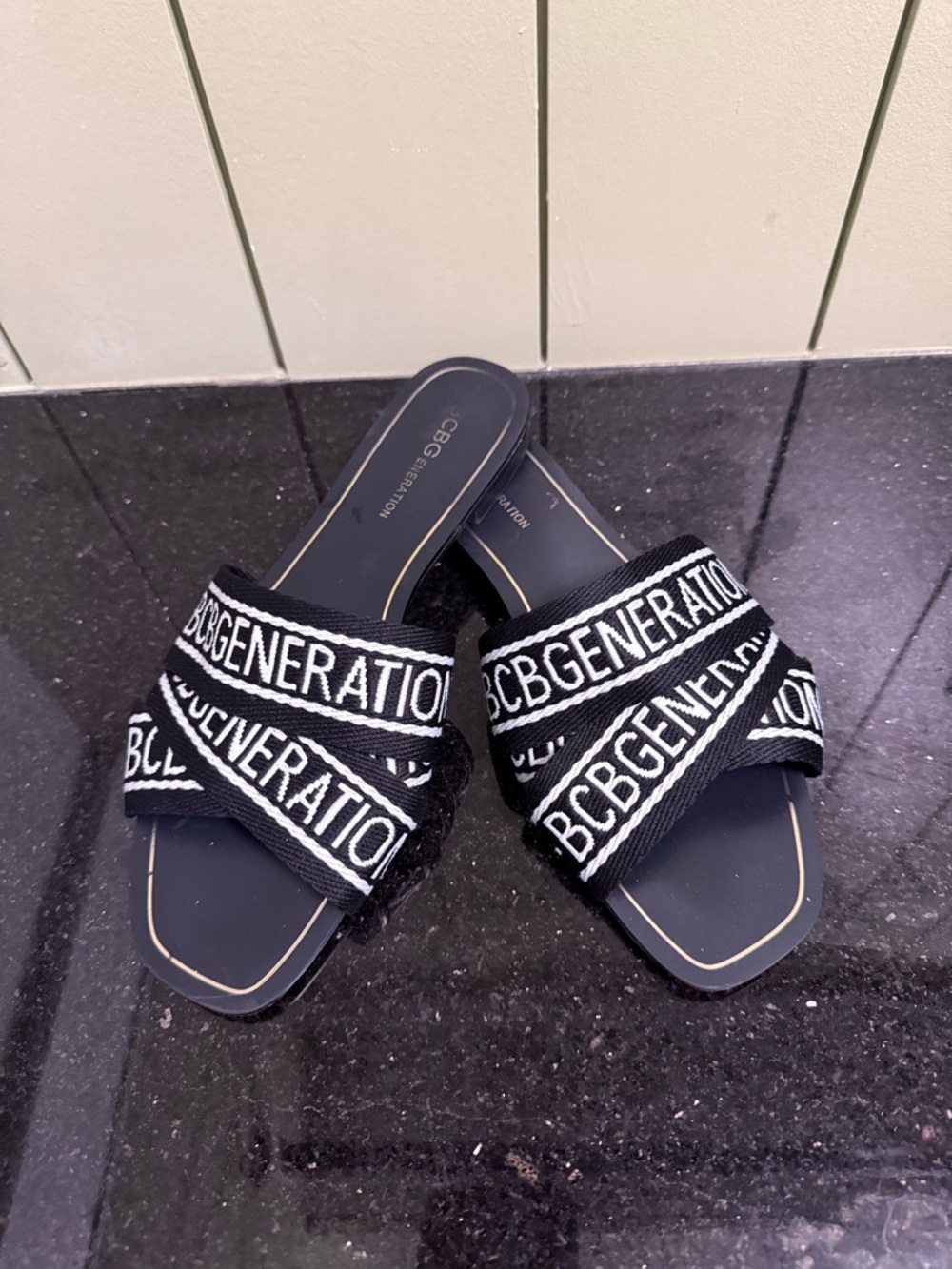BCBGeneration Black and White Logo Crisscross Slide Sandals
